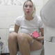 A platinum blonde, European girl desperately sits down on a toilet and takes a shit. Audible farting, pooping and plops are heard. Presented in 720P HD. About 6 minutes.